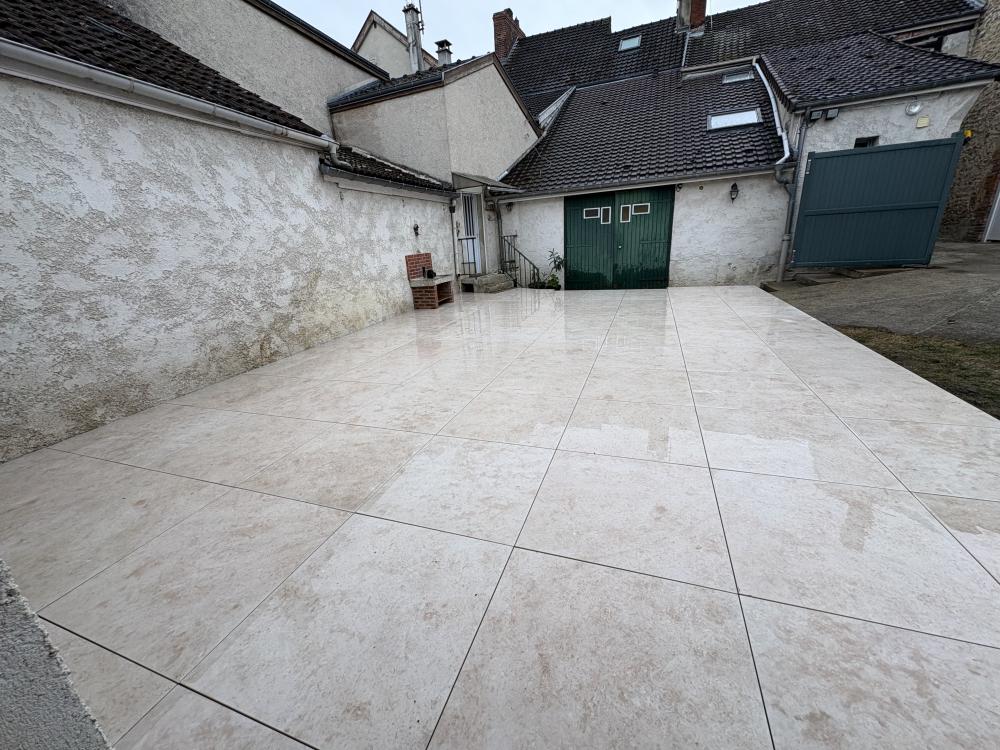 Terrasse grès ceram sur structure Terrassteel à Hauvillers 